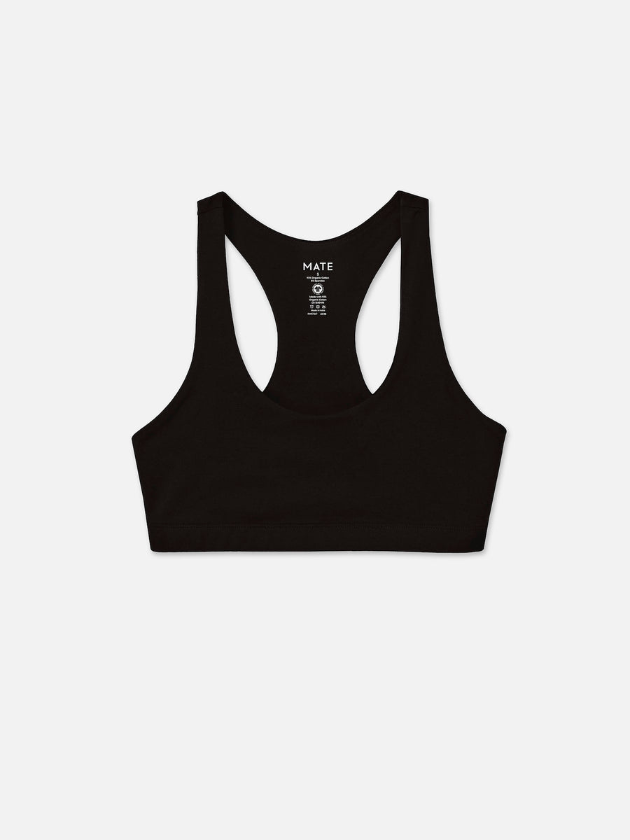Organic Stretch Sports Bra in Jet Black — flat lay product photo