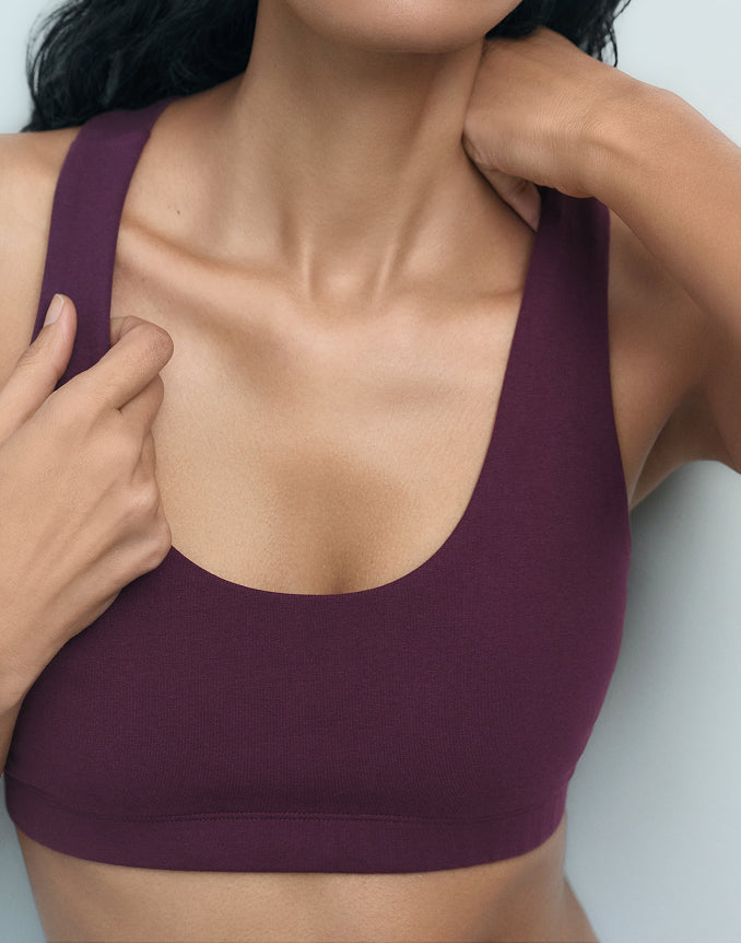 Close-up of a fig purple organic stretch sports bra – MATE the Label activewear
