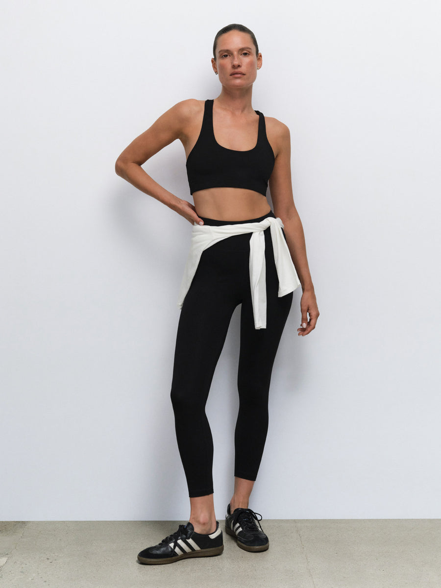 Organic Stretch Sports Bra Midi Legging in Jet Black — product photo