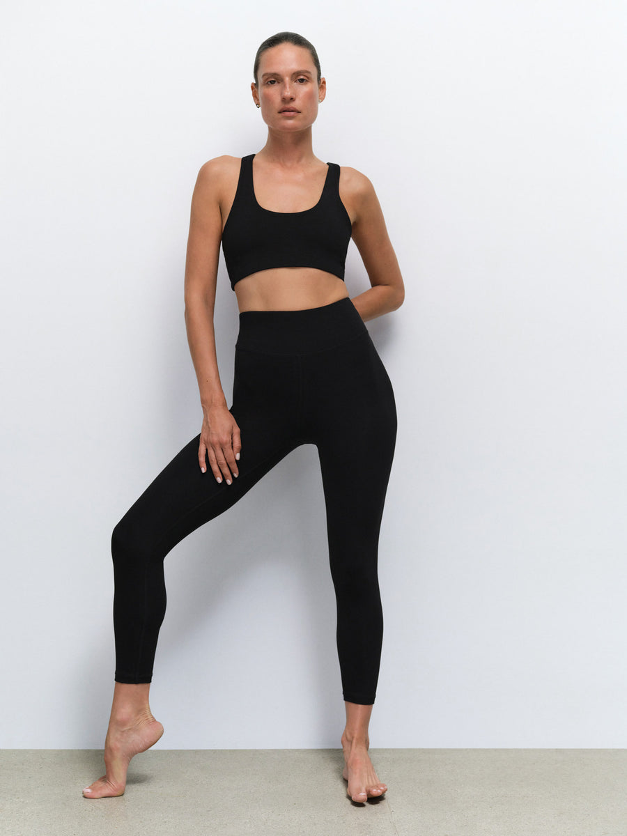 Organic Stretch Sports Bra Midi Legging in Jet Black — product photo