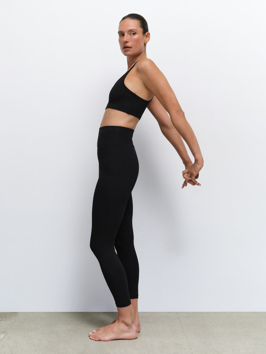 Organic Stretch Sports Bra Midi Legging in Jet Black — product photo