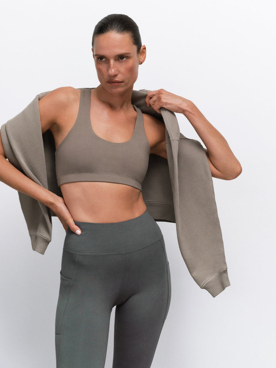 Organic Stretch Sports Bra Pocket Legging in Pebble / Forest — product photo
