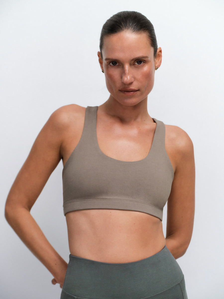 Organic Stretch Sports Bra Pocket Legging in Pebble / Forest — product photo