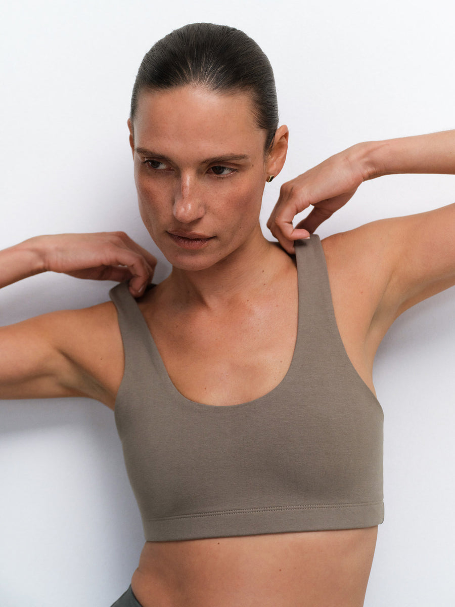 Organic Stretch Sports Bra Pocket Legging in Pebble / Forest — product photo