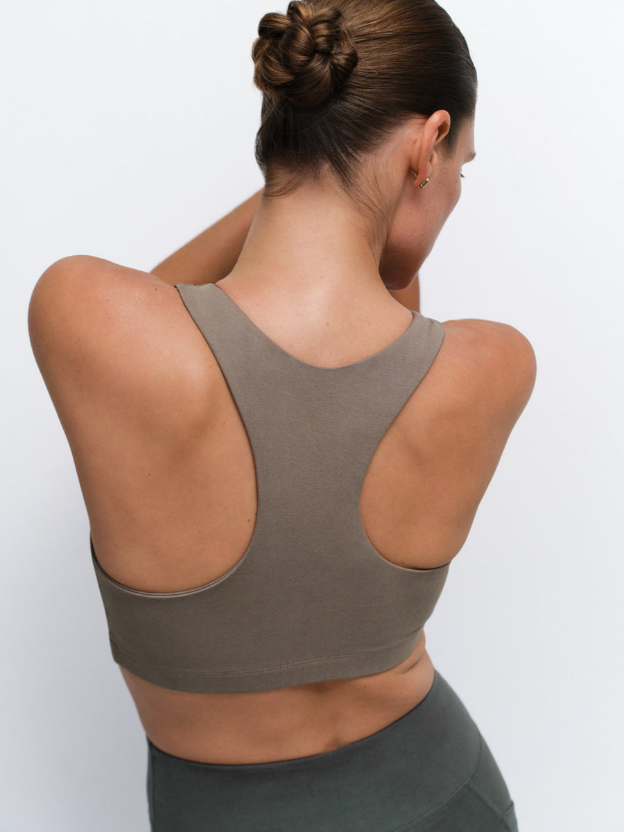 Organic Stretch Sports Bra Pocket Legging in Pebble / Forest — product photo