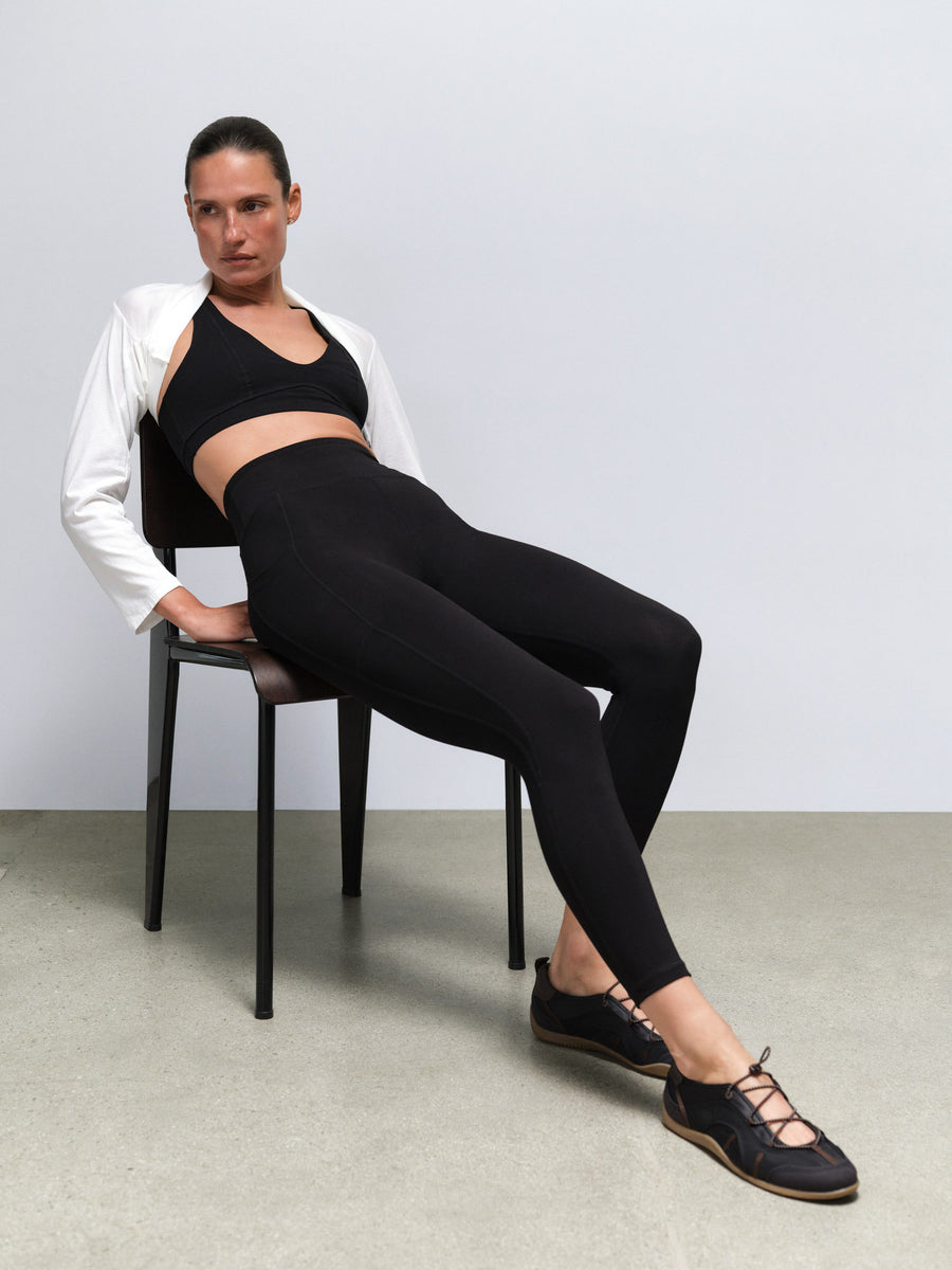 Organic Stretch Vneck Bra Midi Legging With Pockets in Jet Black — product photo