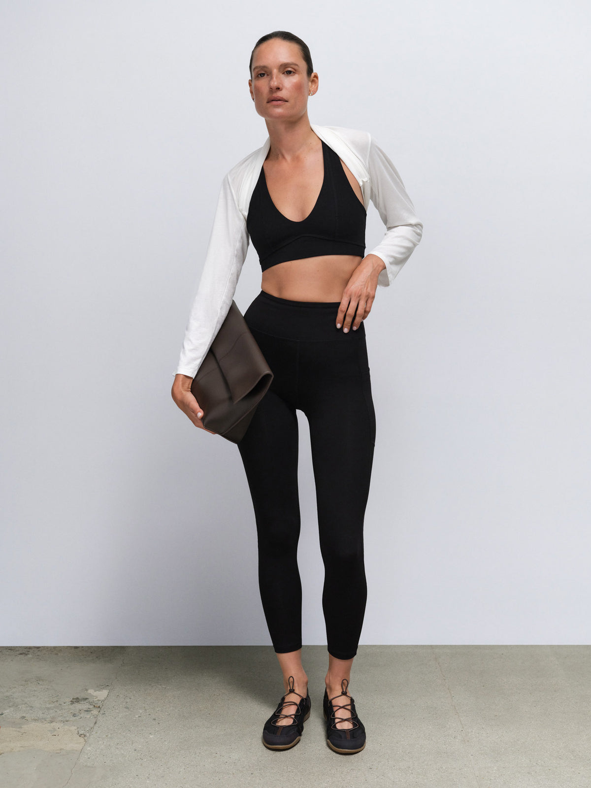 Organic Stretch Vneck Bra Midi Legging With Pockets in Jet Black — product photo
