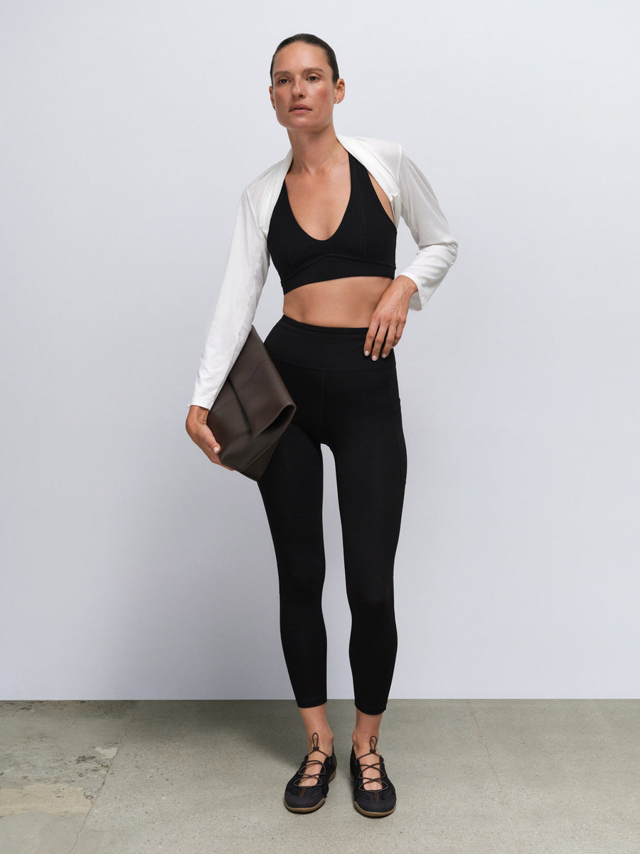 Organic Stretch Vneck Bra Midi Legging With Pockets in Jet Black — product photo
