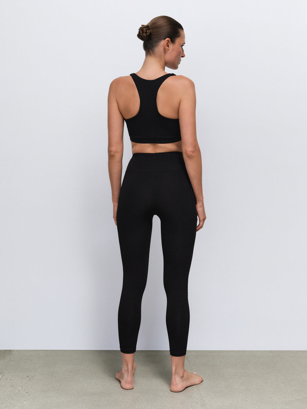 Organic Stretch Vneck Bra Midi Legging With Pockets in Jet Black — product photo