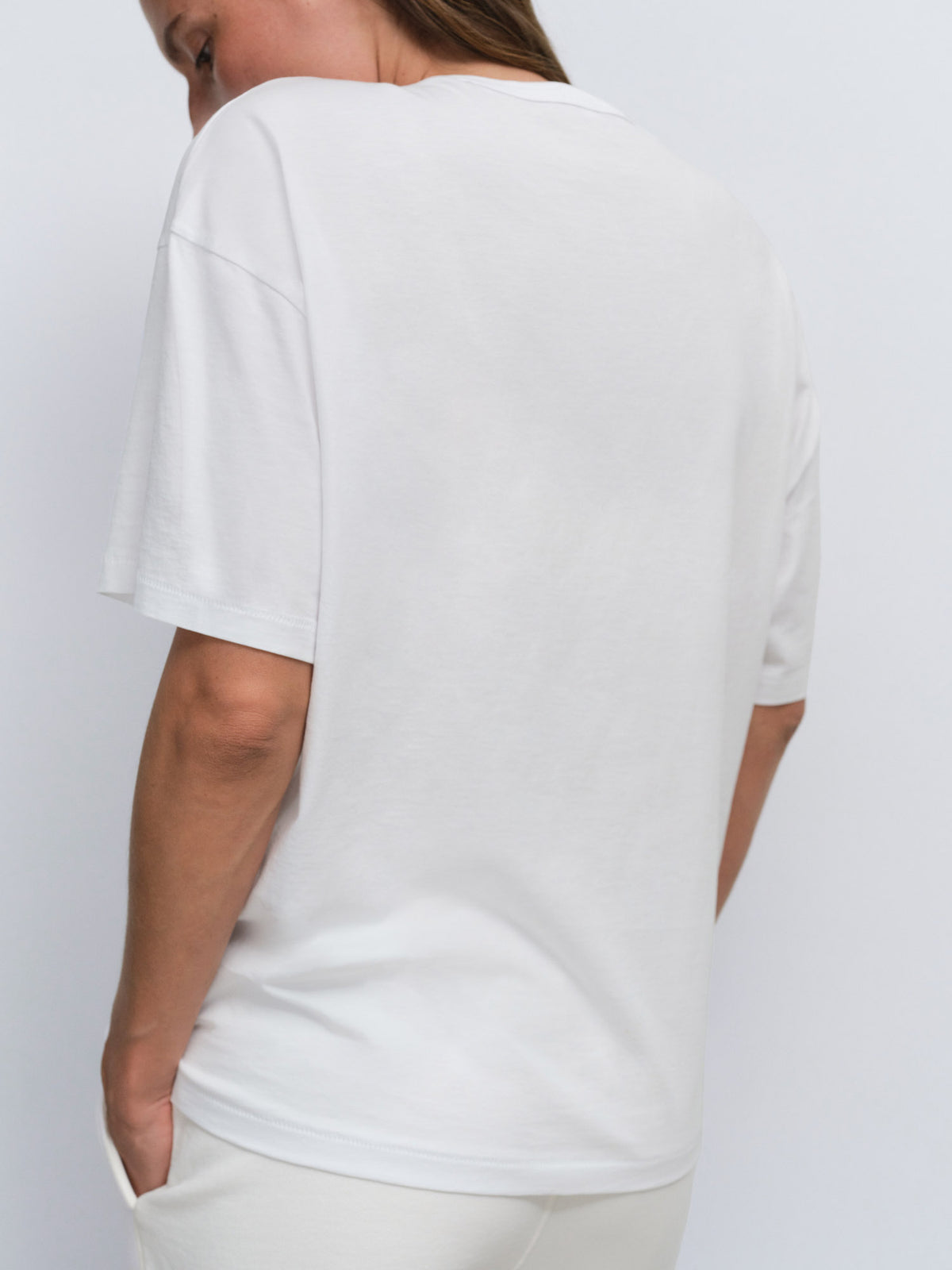 Organic Pima Oversized Tee Organic Fleece Relaxed Pocket Sweatpant in True White / Bone — product photo