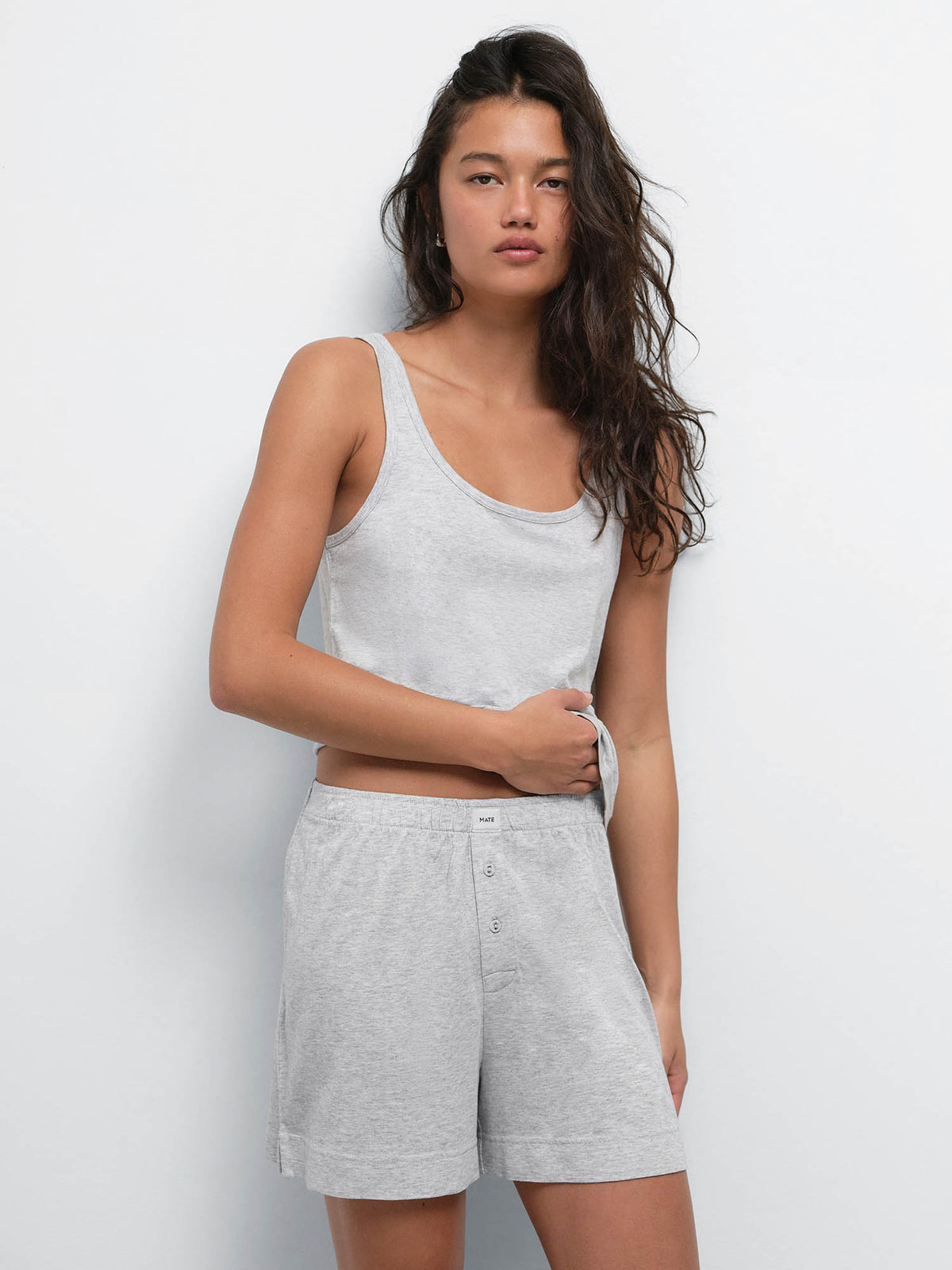 Model wearing the Tencel Sleep Scoop Tank and Boxer Short in Heather Grey