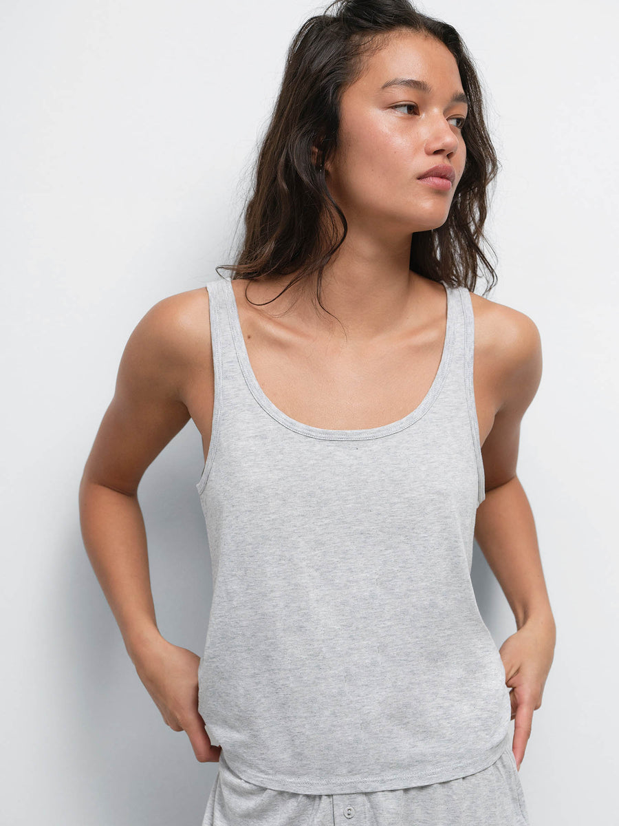 Model with hands at her sides wearing the Tencel Sleep Scoop Tank in Heather Grey with the matching Boxer Short
