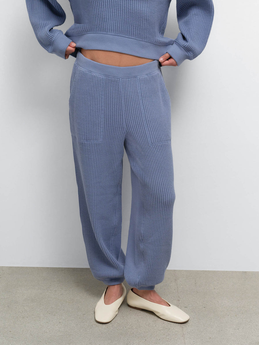 Close-up of the Organic Waffle Sweatpant in Bay worn with cream ballet flats