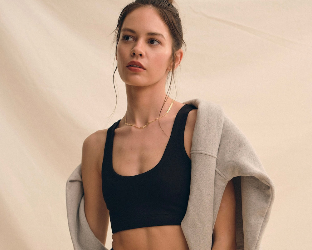 woman in black sports bra