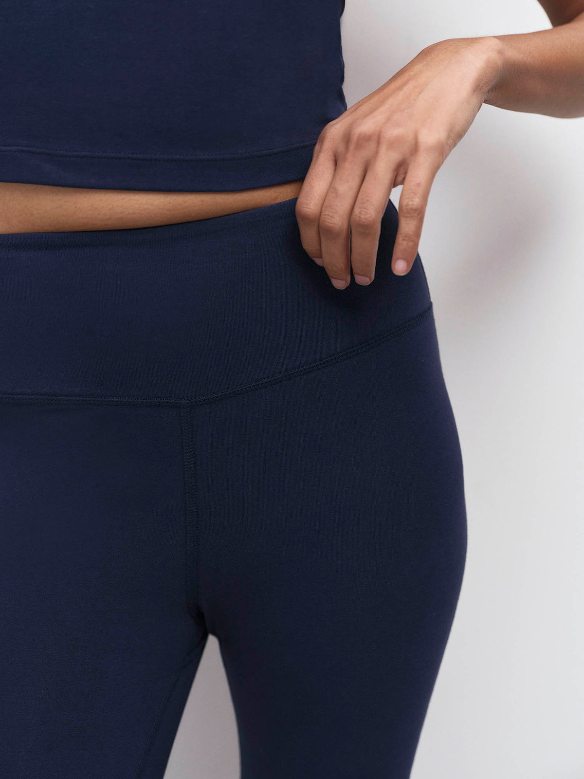 Close-up of the high-rise waistband on midnight navy organic stretch leggings – MATE the Label