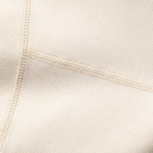Organic Stretch fabric detail, showing the smooth, flexible texture of organic cotton with stretch.